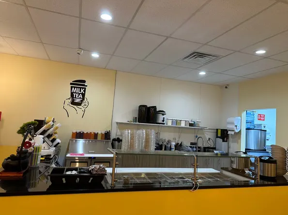 Brightly lit bubble tea store interior with equipment and decor at Asahi Poke & Tea, a Bubble tea store in Beacon
